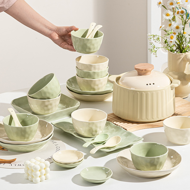 French-style cream-colored ceramic bowl and plate set