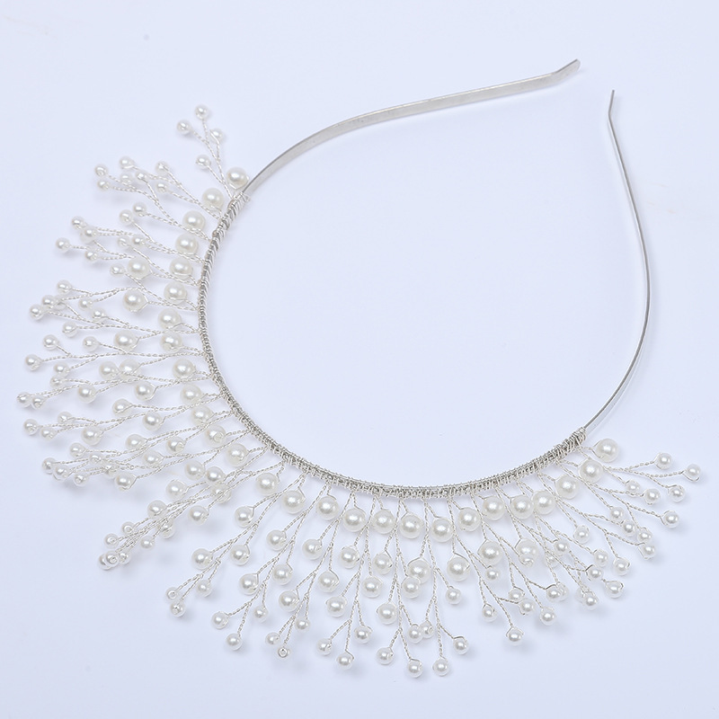Exaggerated pearl standing crown