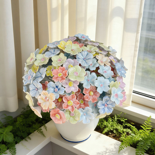 Artificial flowers in small vases for home decoration