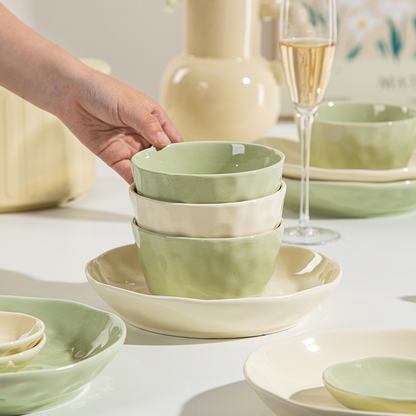 French-style cream-colored ceramic bowl and plate set