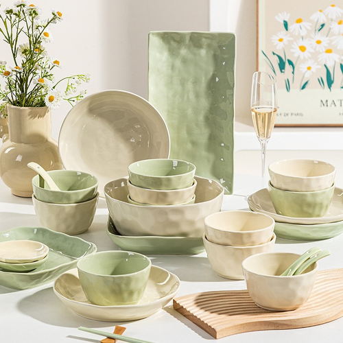 French-style cream-colored ceramic bowl and plate set